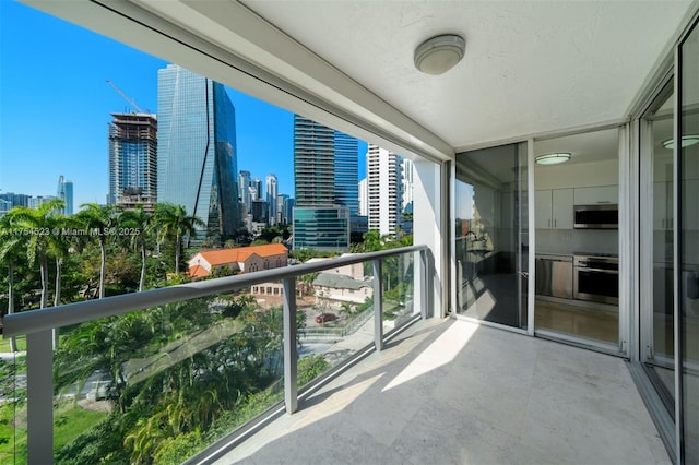 balcony featuring a view of city