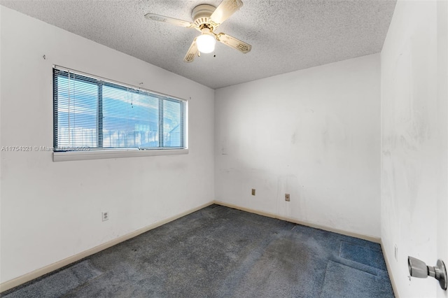 unfurnished room with carpet flooring, ceiling fan, a textured ceiling, and baseboards