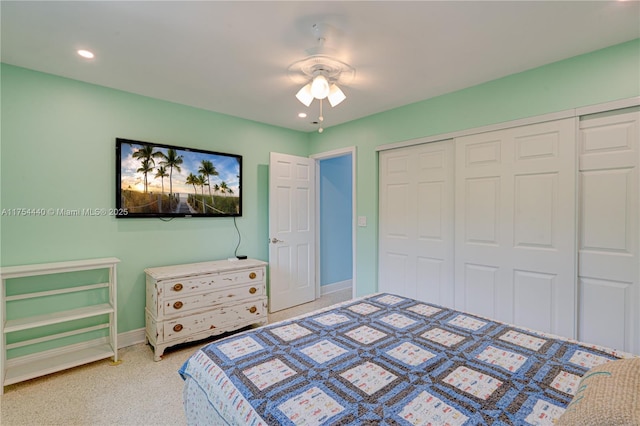 bedroom with ceiling fan, a closet, recessed lighting, and baseboards