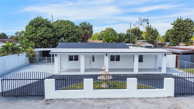 view of front of property with a fenced front yard