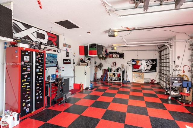 garage featuring freestanding refrigerator