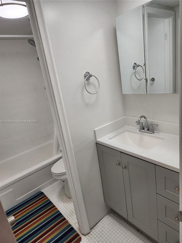 bathroom featuring vanity, shower / tub combo, tile patterned flooring, and toilet