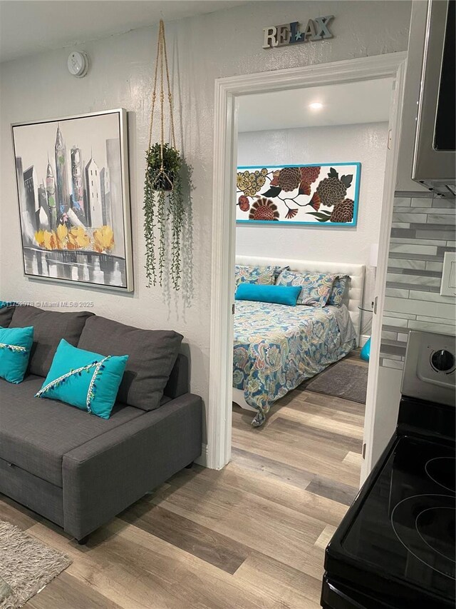 bedroom with wood finished floors