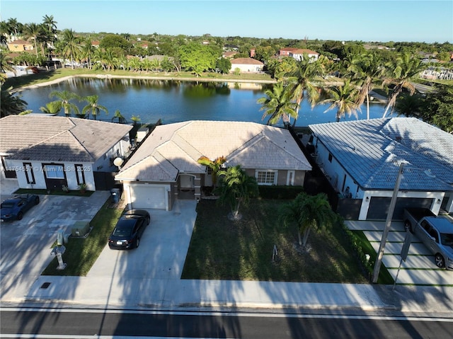 bird's eye view with a water view