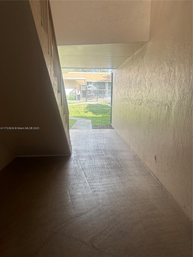 interior space featuring a textured wall