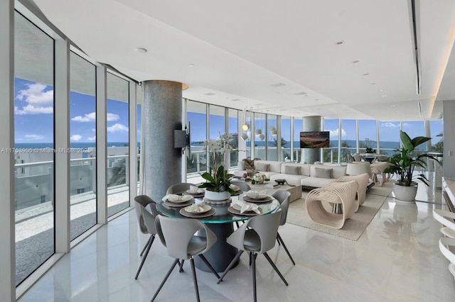 dining room featuring floor to ceiling windows