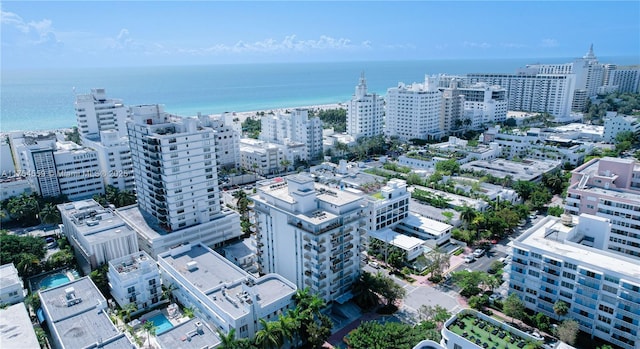 bird's eye view featuring a view of city and a water view