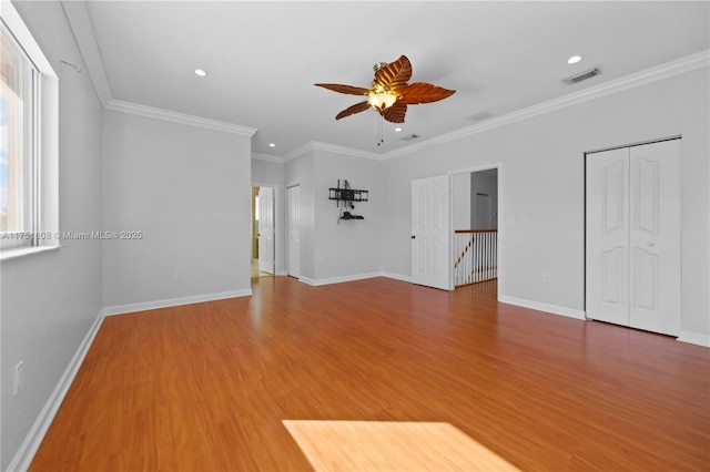 interior space featuring visible vents, baseboards, recessed lighting, wood finished floors, and a ceiling fan