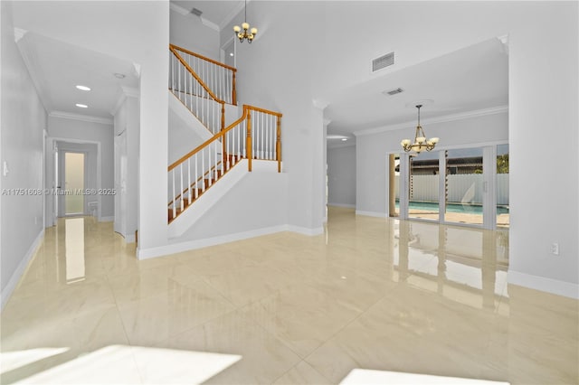 interior space with visible vents, a chandelier, baseboards, ornamental molding, and stairs