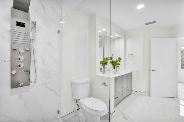 full bathroom with a marble finish shower, visible vents, toilet, marble finish floor, and vanity