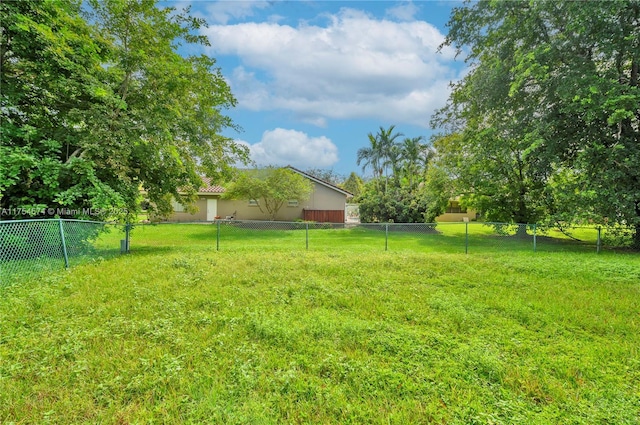 view of yard with fence