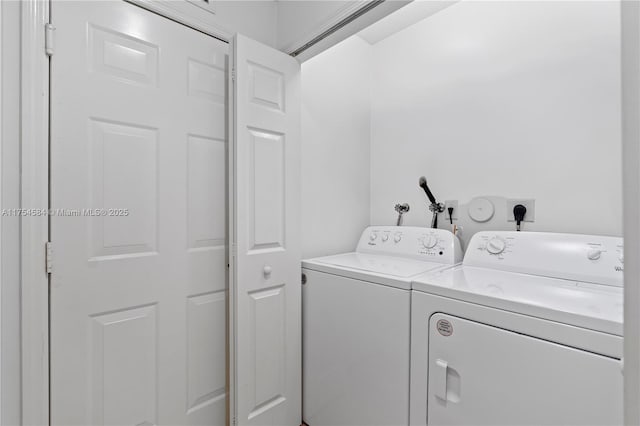 laundry area featuring laundry area and independent washer and dryer