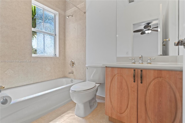 bathroom with shower / bathtub combination, vanity, tile patterned flooring, and toilet