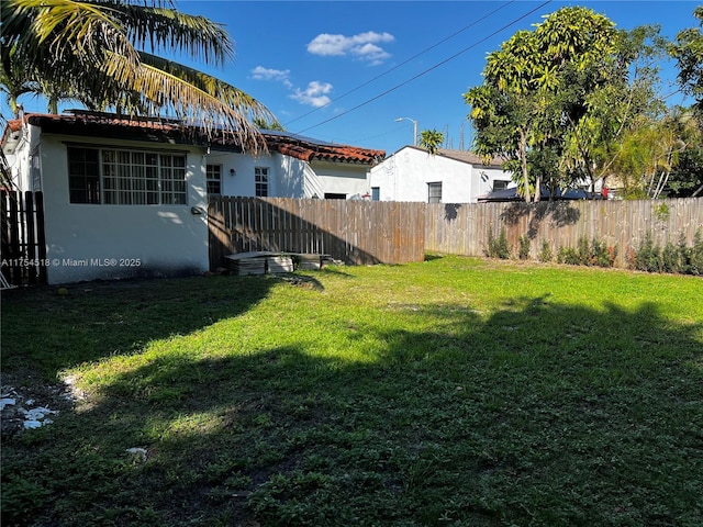 view of yard with fence