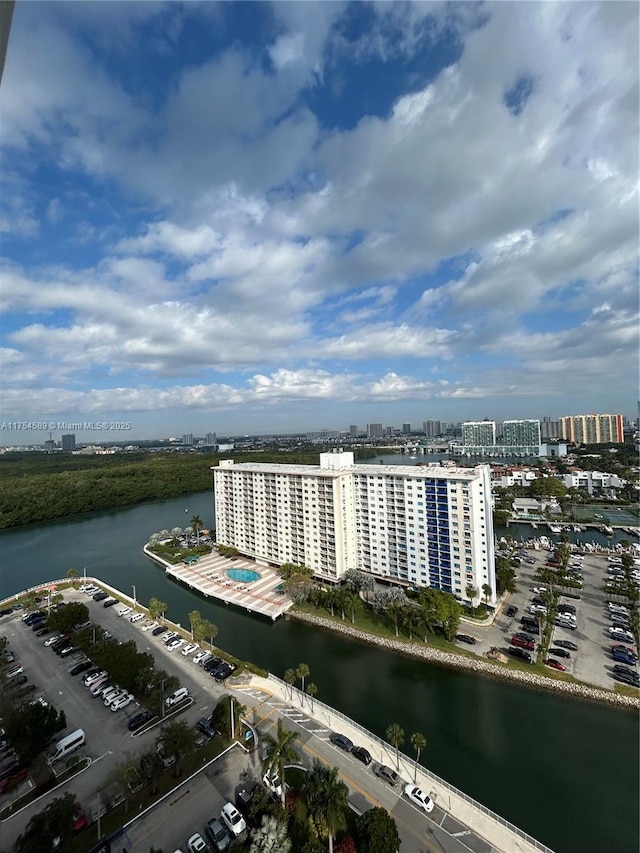 aerial view featuring a water view and a city view