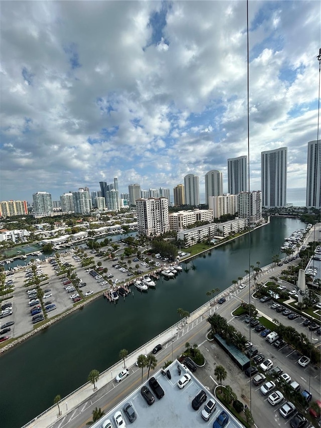 drone / aerial view with a view of city and a water view