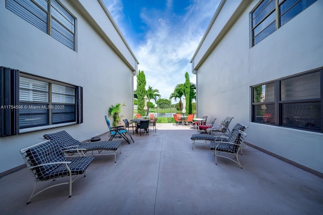 view of patio with outdoor dining area