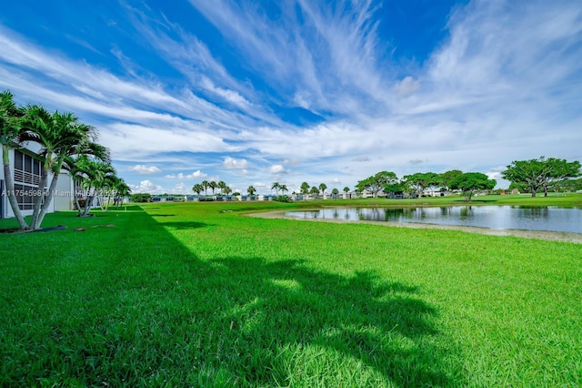 view of yard with a water view