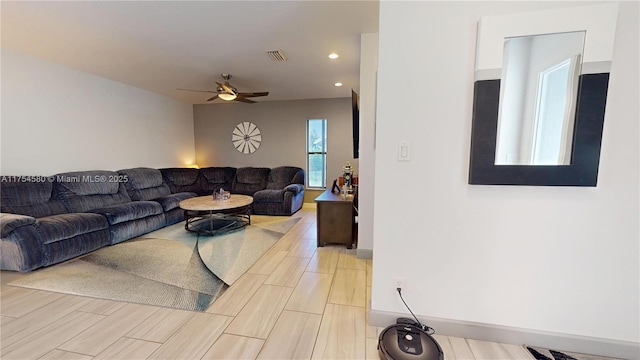 living area with ceiling fan, recessed lighting, visible vents, baseboards, and wood tiled floor