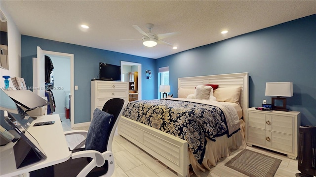 bedroom with a textured ceiling, ceiling fan, ensuite bath, and recessed lighting