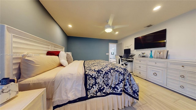 bedroom with ceiling fan, recessed lighting, visible vents, and light wood-style floors