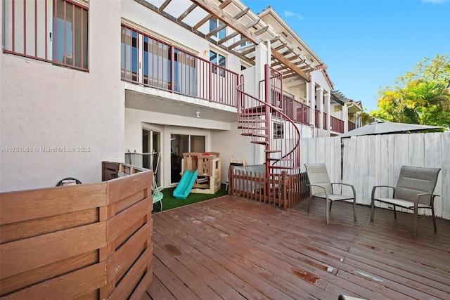 wooden terrace with stairs and fence