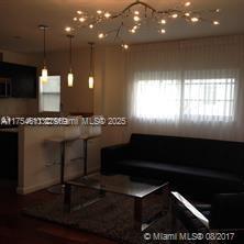 kitchen featuring plenty of natural light and pendant lighting