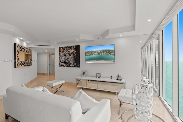 living room featuring a wealth of natural light and recessed lighting