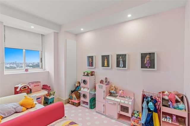 recreation room featuring carpet flooring and recessed lighting