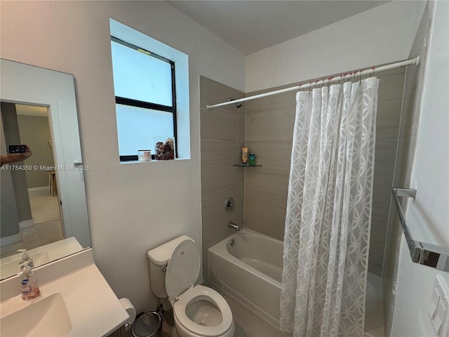 full bathroom with vanity, toilet, and shower / bath combo with shower curtain