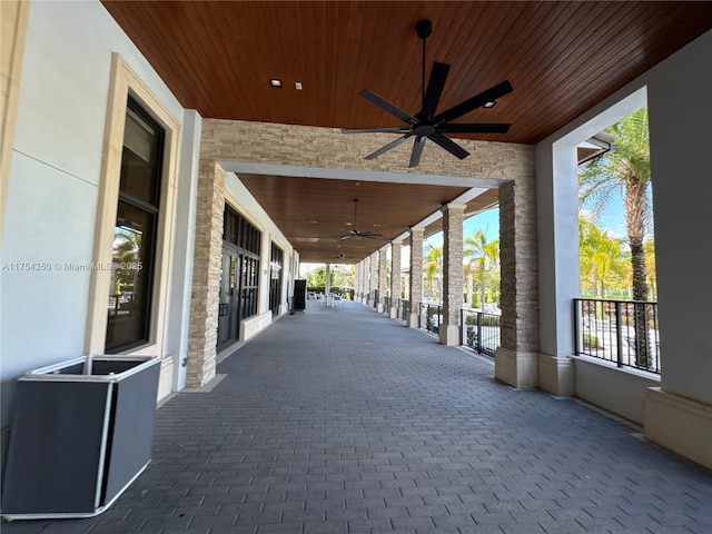 view of patio / terrace featuring ceiling fan