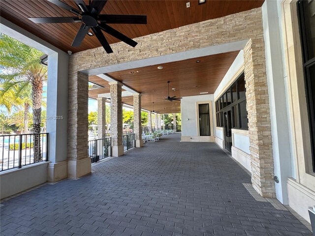 view of patio / terrace featuring ceiling fan