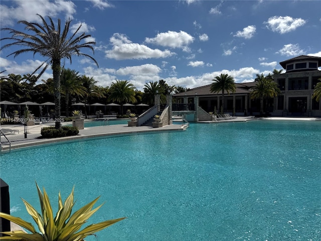 community pool featuring a patio