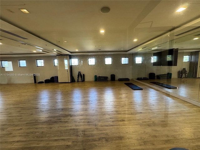 workout room with wood finished floors