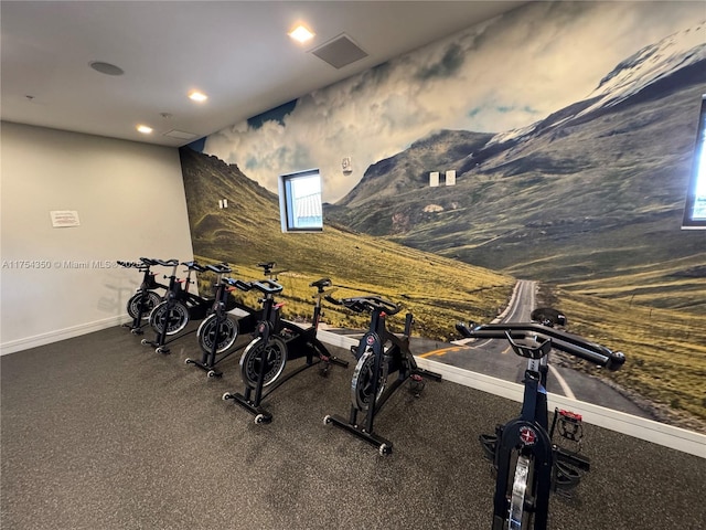 exercise area with baseboards and recessed lighting