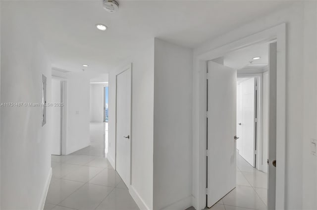 1010 SW 2nd Ave Unit Lph05, Miami, FL 33130 - hallway with light tile patterned floors, recessed lighting, and baseboards