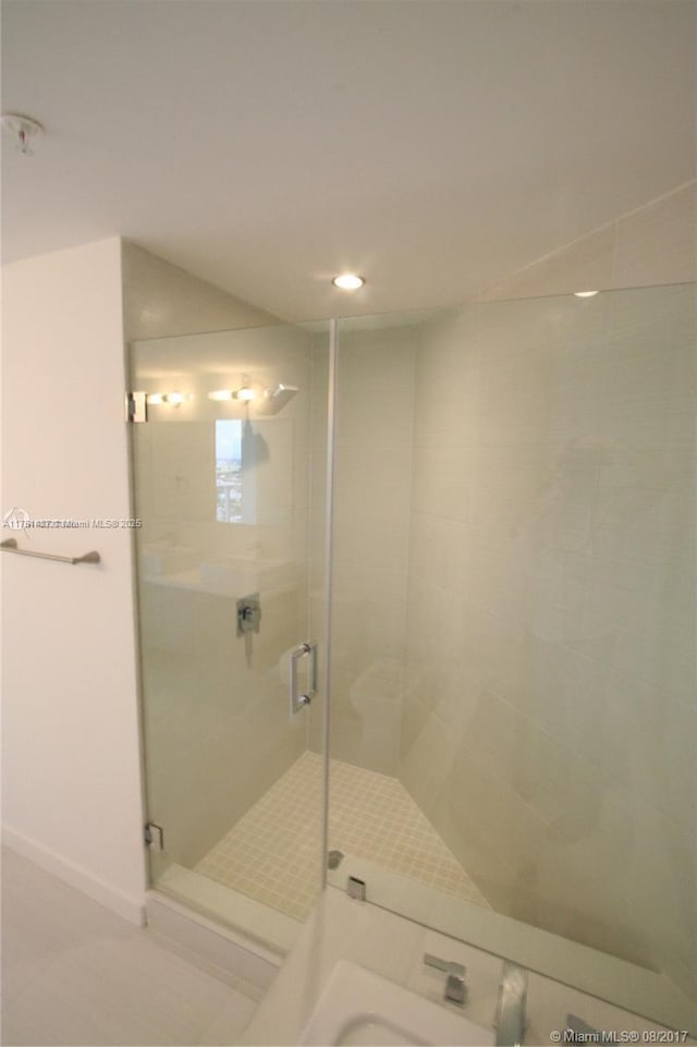 bathroom with a stall shower