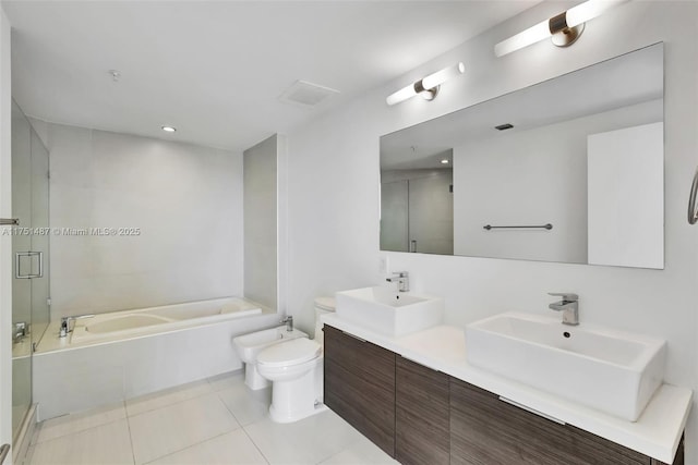 1010 SW 2nd Ave Unit Lph05, Miami, FL 33130 - bathroom with a garden tub, a bidet, double vanity, tile patterned floors, and a shower stall