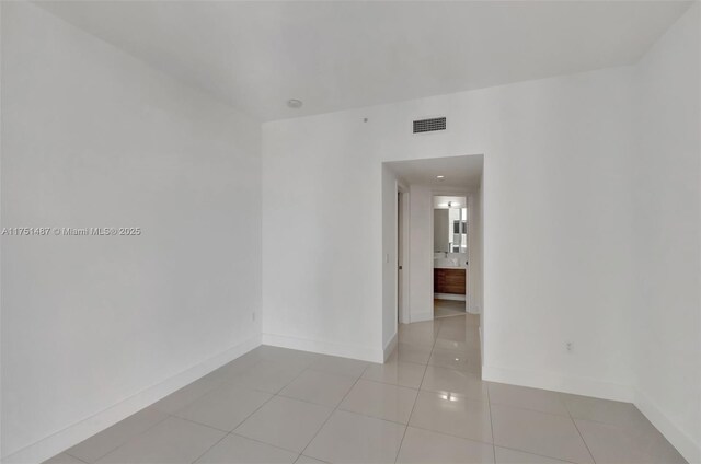 1010 SW 2nd Ave Unit Lph05, Miami, FL 33130 - spare room with baseboards and tile patterned floors