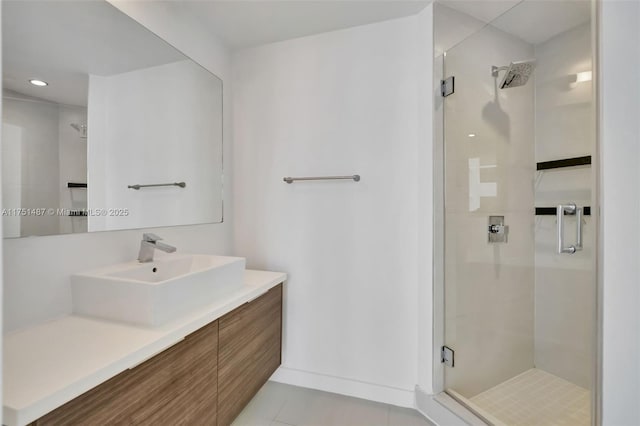 1010 SW 2nd Ave Unit Lph05, Miami, FL 33130 - bathroom featuring a shower stall, tile patterned flooring, vanity, recessed lighting, and baseboards