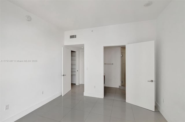 1010 SW 2nd Ave Unit Lph05, Miami, FL 33130 - unfurnished bedroom featuring baseboards and tile patterned floors