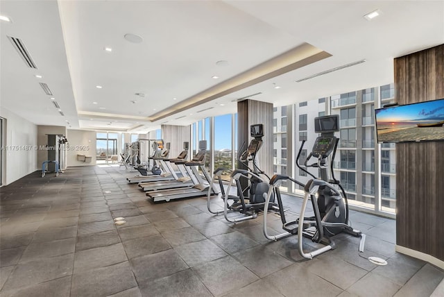 1010 SW 2nd Ave Unit Lph05, Miami, FL 33130 - gym with a raised ceiling and a wall of windows