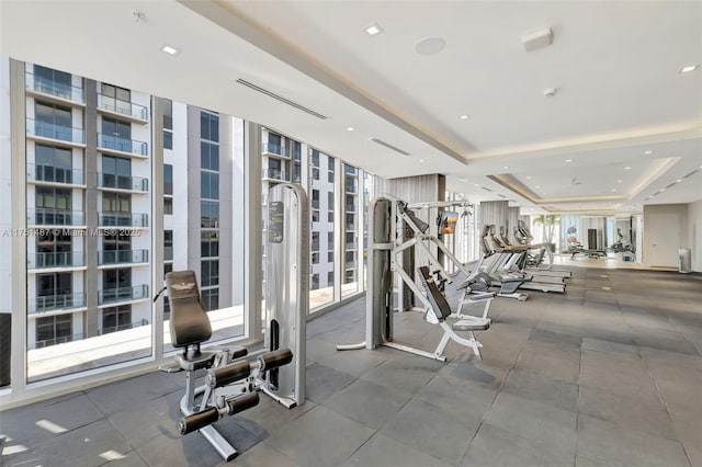 1010 SW 2nd Ave Unit Lph05, Miami, FL 33130 - exercise room with a tray ceiling and floor to ceiling windows