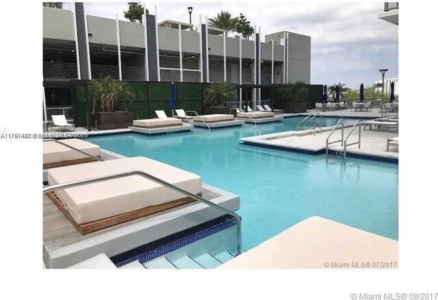 1010 SW 2nd Ave Unit Lph05, Miami, FL 33130 - community pool with a patio area