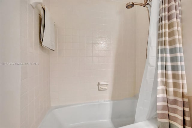 full bathroom with shower / tub combo with curtain