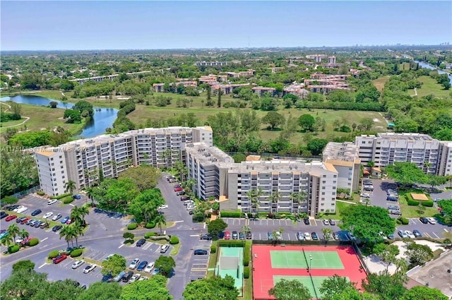 bird's eye view featuring a view of city and a water view