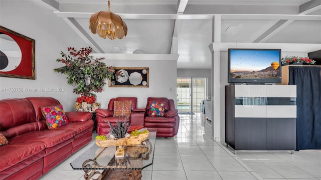 living area with lofted ceiling with beams and light tile patterned flooring