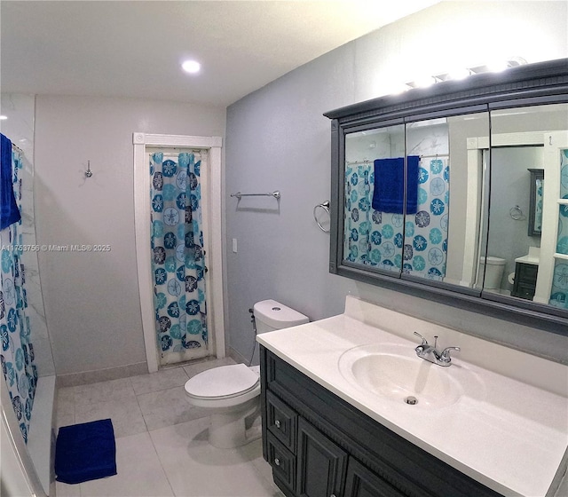 bathroom featuring tile patterned floors, vanity, toilet, and a shower with curtain