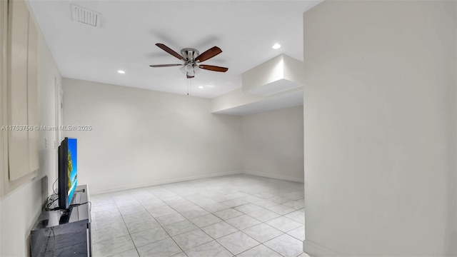 spare room featuring baseboards, recessed lighting, visible vents, and a ceiling fan