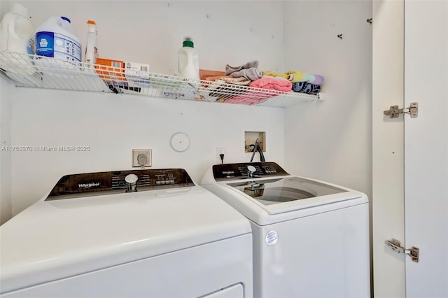 clothes washing area featuring laundry area and independent washer and dryer